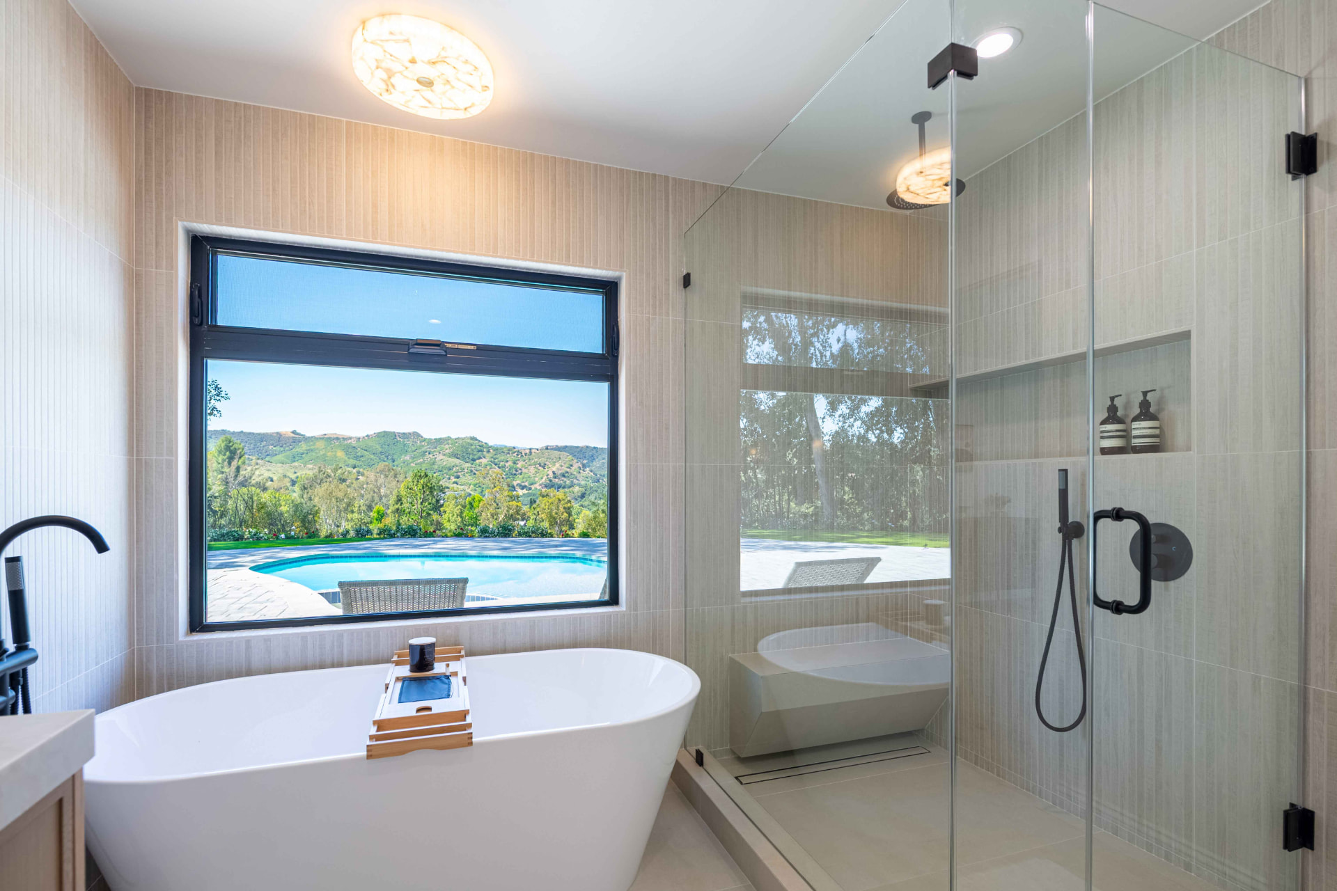 Freestanding tub bath with mountain view window